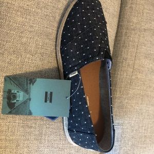 Brand new Toms, never worn, new in box